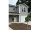 Charming two-story home with gray siding, white trim, and a one-car garage with a freshly landscaped yard at 2012 Crown Point Dr # A, Albemarle, NC 28001