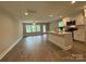 Spacious living room connects to the kitchen, creating an open layout perfect for entertaining guests at 2012 Crown Point Dr # A, Albemarle, NC 28001