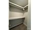Walk-in closet offers ample storage with shelving and closet rods at 2012 Crown Point Dr # A, Albemarle, NC 28001