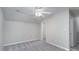 Spacious bedroom with neutral paint, carpet flooring, and a ceiling fan for added comfort at 2153 Pavilion Ct, Rock Hill, SC 29732
