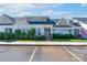 Inviting home with neat landscaping, set back from parking, and decorated with an American flag at 2153 Pavilion Ct, Rock Hill, SC 29732