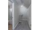 Hallway with carpet, leading to a bathroom with a glass-enclosed shower at 2153 Pavilion Ct, Rock Hill, SC 29732