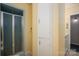 Bathroom features a shower with blue trim, white cabinets, and yellow walls at 227 Country Club Cir, Shelby, NC 28150