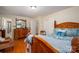 Spacious bedroom showcasing wood floors and a dresser at 227 Country Club Cir, Shelby, NC 28150