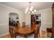 Dining area with stylish wood table and chairs at 227 Country Club Cir, Shelby, NC 28150