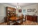Dining area with stylish wood table and chairs at 227 Country Club Cir, Shelby, NC 28150