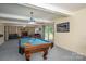 Basement game room with pool table and fireplace at 227 Country Club Cir, Shelby, NC 28150