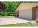 Brick house with two-car garage and lush lawn at 227 Country Club Cir, Shelby, NC 28150