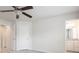Spacious bedroom with adjoining bathroom and neutral color palette at 2448 Mariners Cove Ln, Denver, NC 28037