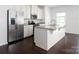 Kitchen with stainless steel appliances and granite countertop island at 2448 Mariners Cove Ln, Denver, NC 28037