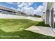 Backyard featuring a lush lawn and a white fence for privacy, a beautiful outdoor space at 2608 Wild Azalea Ct # 9, Monroe, NC 28110