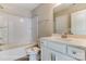 Bathroom featuring a shower-tub combo and vanity with white cabinets at 2608 Wild Azalea Ct # 9, Monroe, NC 28110