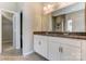 Bright bathroom featuring a double vanity with granite countertop and tile flooring at 2608 Wild Azalea Ct # 9, Monroe, NC 28110