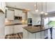 Stylish kitchen with a functional island and stainless steel appliances and designer lighting, offering a comfortable cooking experience at 2608 Wild Azalea Ct # 9, Monroe, NC 28110