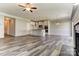 Bright open-concept living space, highlighting the kitchen with white cabinets and a large island and adjoining Gathering room at 2608 Wild Azalea Ct # 9, Monroe, NC 28110