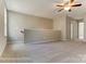 Spacious loft with carpet flooring and a ceiling fan at 2608 Wild Azalea Ct # 9, Monroe, NC 28110