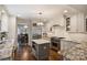 Well-appointed kitchen with stainless steel appliances, granite countertops, and a functional center island at 2627 Hampton Ave, Charlotte, NC 28207