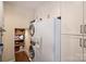 Bright laundry area with appliances and ample storage and organization at 2627 Hampton Ave, Charlotte, NC 28207