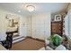 Bright office space featuring built-in storage, neutral walls, and a decorative light fixture at 2627 Hampton Ave, Charlotte, NC 28207
