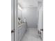 Well-lit bathroom with vanity, granite countertop, and tile flooring for a clean, modern aesthetic at 2906 Hillside Springs Dr, Charlotte, NC 28209
