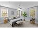 Spacious bedroom with large windows allowing for ample natural light at 2906 Hillside Springs Dr, Charlotte, NC 28209