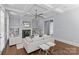 Bright living room with coffered ceilings, fireplace and built-in shelving at 2906 Hillside Springs Dr, Charlotte, NC 28209
