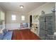 Cozy playroom with hardwood floors, wainscoting, and decorative world map mural at 3664 Privette Rd, Matthews, NC 28104