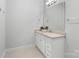 A well-lit bathroom with a large mirror, a vanity with storage, and neutral accents at 3817 Arial Ln # 145, York, SC 29745