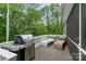 Outdoor deck features a grill and lounge chairs, perfect for outdoor entertaining and relaxation at 3817 Arial Ln # 145, York, SC 29745