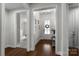Welcoming foyer with hardwood floors, elegant lighting, and a view into other rooms, showcasing a bright and airy atmosphere at 3817 Arial Ln # 145, York, SC 29745
