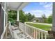Cozy front porch with comfortable seating and lush landscaping, perfect for enjoying the outdoors at 3817 Arial Ln # 145, York, SC 29745