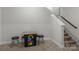 Finished basement area featuring a unique game console and stools, offering a fun recreation space at 3817 Arial Ln # 145, York, SC 29745