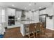 Modern kitchen with stainless steel appliances, light countertops, and a large center island at 3817 Arial Ln # 145, York, SC 29745