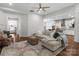 Inviting living room featuring hardwood floors and a comfortable sectional sofa at 3817 Arial Ln # 145, York, SC 29745