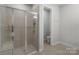 Modern bathroom shower with glass enclosure, tile surround, and mosaic accents at 3817 Arial Ln # 145, York, SC 29745