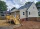 Backyard of home featuring a new wooden deck and a well maintained, fenced-in yard at 406 4Th St, Spencer, NC 28159