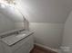 Bathroom featuring granite countertops, bright lighting, and a mirror at 406 4Th St, Spencer, NC 28159