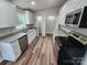 Bright kitchen with stainless steel appliances, granite countertops, and modern cabinetry at 406 4Th St, Spencer, NC 28159