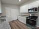 Modern kitchen featuring stainless steel appliances and stylish granite countertops at 406 4Th St, Spencer, NC 28159