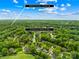 A picturesque aerial view of a lush residential neighborhood in Matthews, North Carolina, with mature trees and well-maintained homes at 4339 Shannamara Dr, Matthews, NC 28104