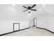Attic room with carpet, black trim and a ceiling fan at 4339 Shannamara Dr, Matthews, NC 28104