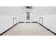 Attic room with carpet, window, white walls, trim and ceiling fan at 4339 Shannamara Dr, Matthews, NC 28104