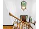 Grand foyer features high ceilings, wooden door, staircase, and light fixture at 4339 Shannamara Dr, Matthews, NC 28104