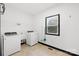 Laundry room features a window, washer and dryer at 4339 Shannamara Dr, Matthews, NC 28104