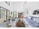 Spacious living room with cozy seating, fireplace, and large windows for ample natural light at 4339 Shannamara Dr, Matthews, NC 28104