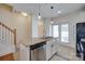 Modern kitchen island with granite countertops and stainless steel appliances at 461 Hurston Cir # 51, Charlotte, NC 28208
