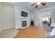 Bright living area with hardwood floors, fireplace, and open layout at 461 Hurston Cir # 51, Charlotte, NC 28208