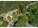 Aerial view showcases the property's location within a lush, tree-filled community at 4938 Sunset Ridge Ct, Charlotte, NC 28269