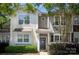 Charming two-story townhome with a well-manicured front yard and inviting entrance at 4938 Sunset Ridge Ct, Charlotte, NC 28269