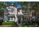 Charming home featuring a welcoming front porch, fresh landscaping, and neutral siding at 4938 Sunset Ridge Ct, Charlotte, NC 28269
